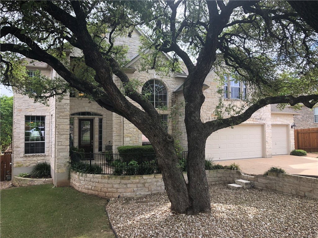 10204 Chestnut Ridge Road Austin, TX 78726 - Photo 1 of 1 a view of a house with a tree