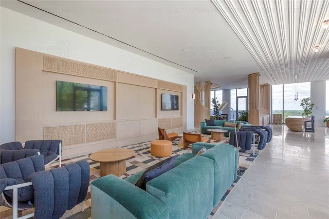 a terrace with outdoor seating and city view