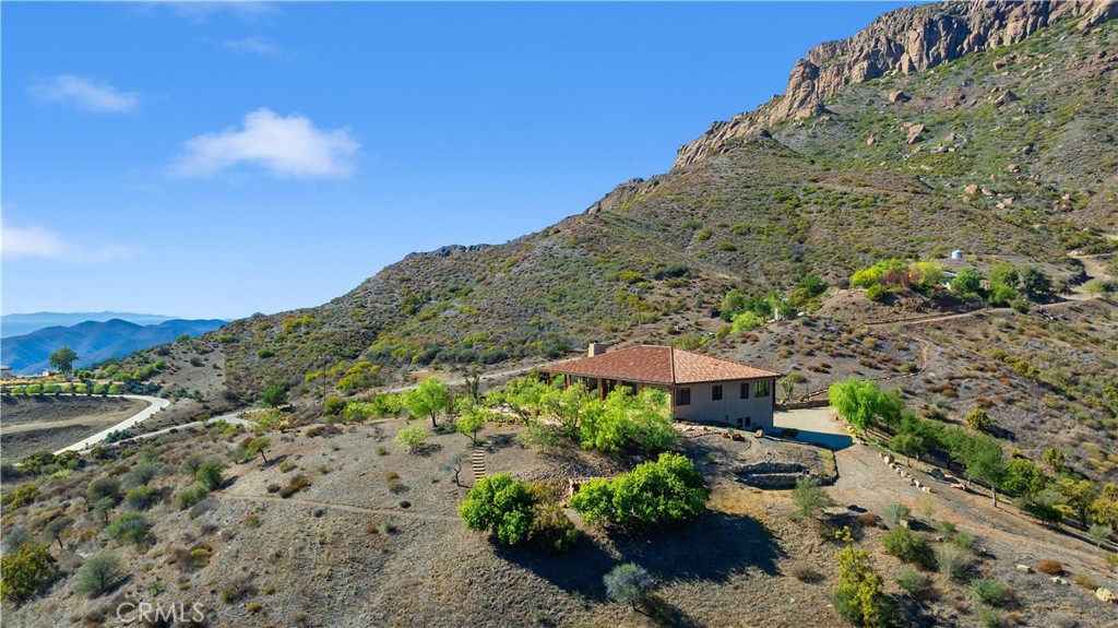 8400 Mipolomol Road Malibu, CA 90265 - Photo 1 of 58 a view of a house with a yard