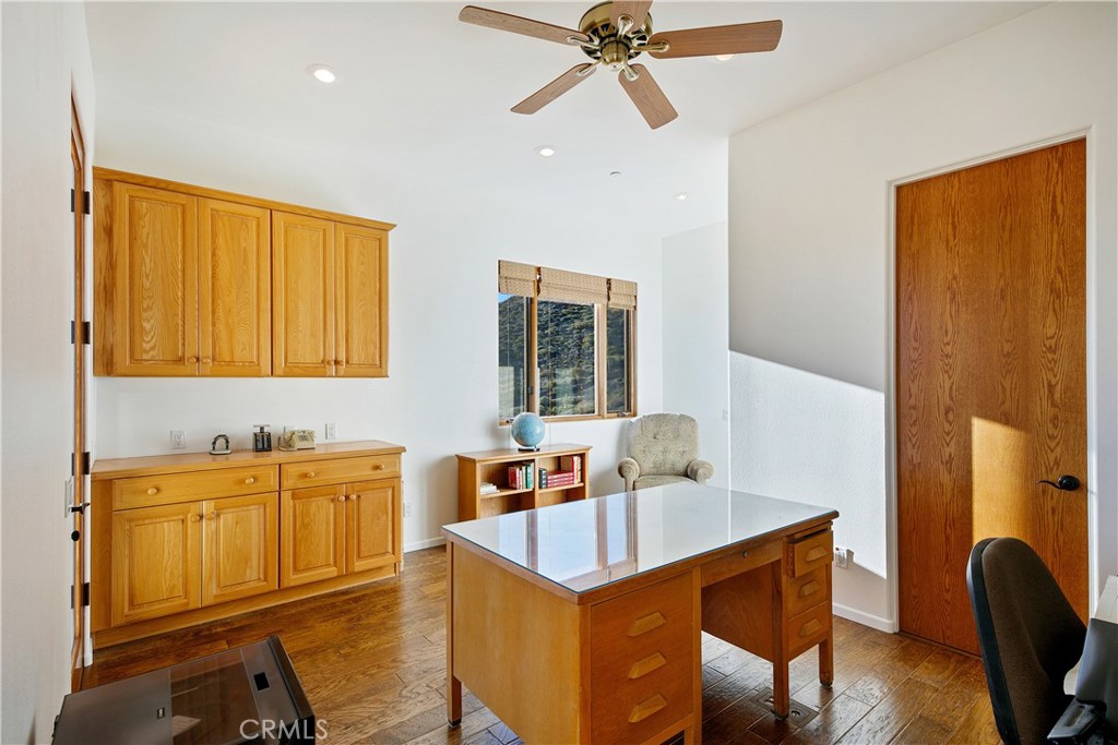 8400 Mipolomol Road Malibu, CA 90265 - Photo 25 of 58 a view of a dining room with furniture and window