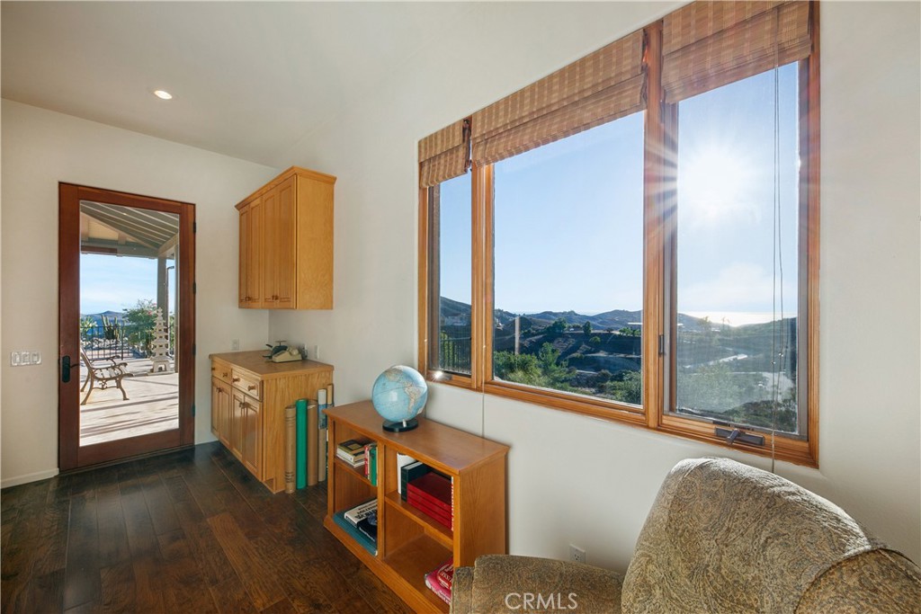 8400 Mipolomol Road Malibu, CA 90265 - Photo 28 of 58 a living room with furniture and a window