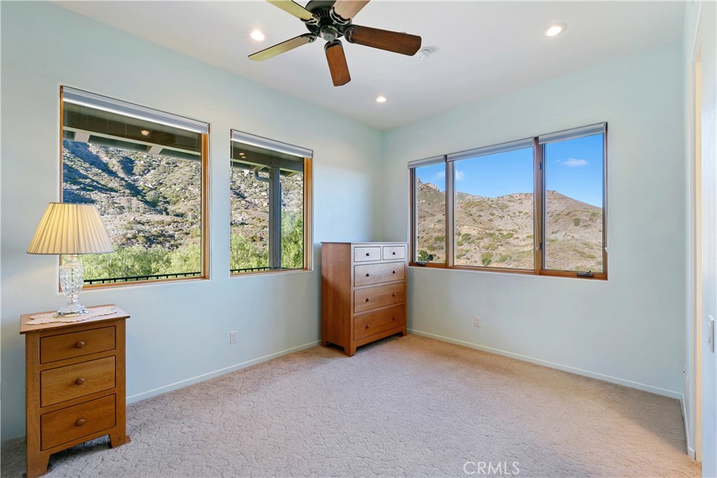 8400 Mipolomol Road Malibu, CA 90265 - Photo 30 of 58 a room with window and cabinet