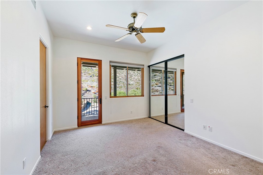 8400 Mipolomol Road Malibu, CA 90265 - Photo 35 of 58 a view of an empty room with a window