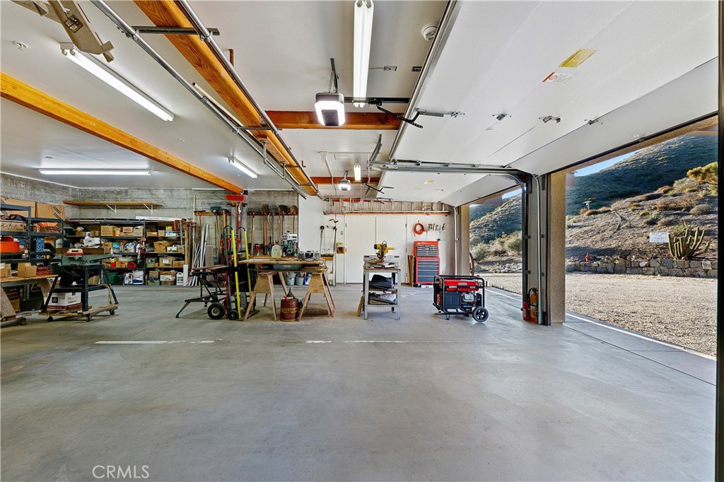 8400 Mipolomol Road Malibu, CA 90265 - Photo 48 of 58 a view of parking garage with cars