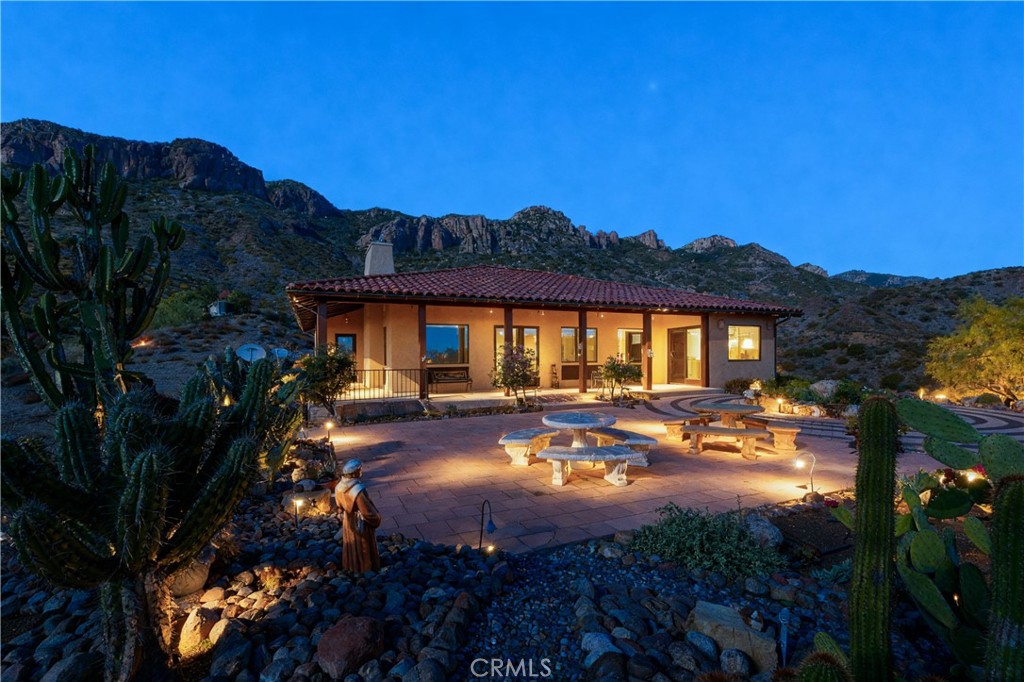 8400 Mipolomol Road Malibu, CA 90265 - Photo 6 of 58 a view of a house with garden