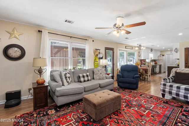 a workspace with furniture and wooden floor