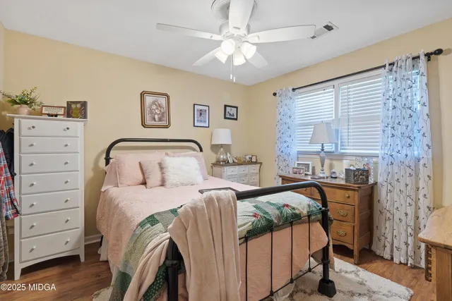 a view of yard with patio