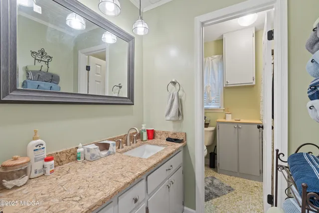 a view of a house with a yard porch and sitting area