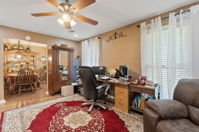 a view of a dining room with furniture