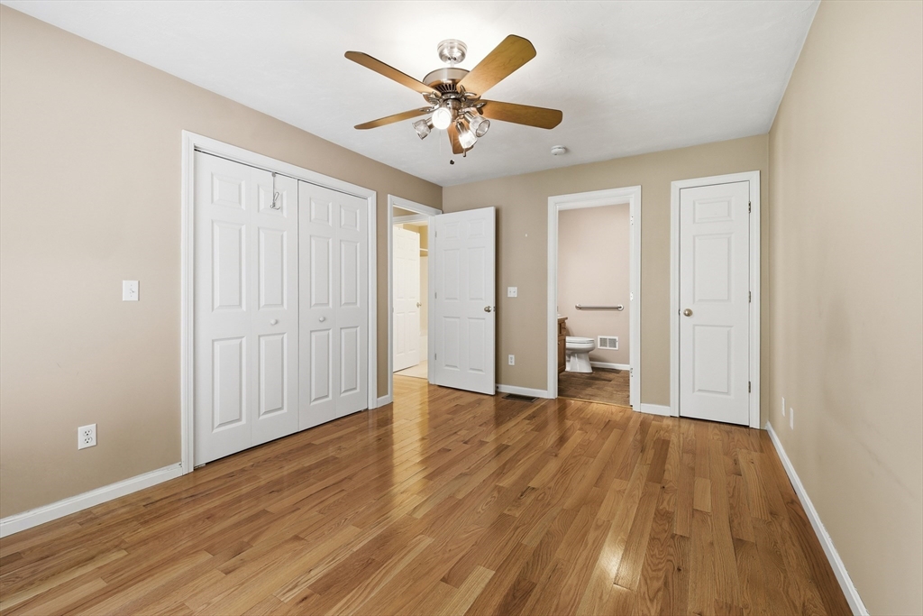 9 Rock Marsh Road, Unit B Wareham, MA 02571 - Photo 23 of 41 wooden floor in an empty room with a window