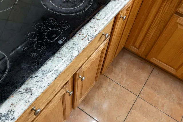 a spacious bedroom with a bed and a couch