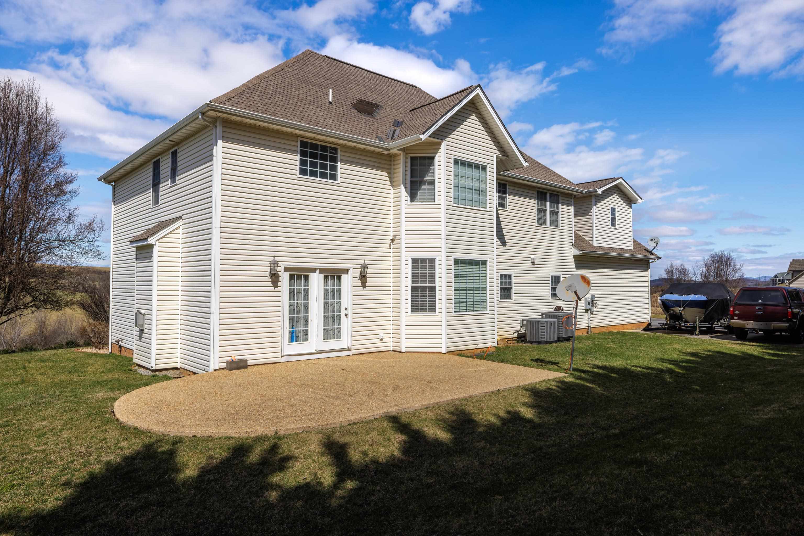 635 Long Meadow Road Fishersville, VA 22939 - Photo 43 of 63 a front view of a house with a yard