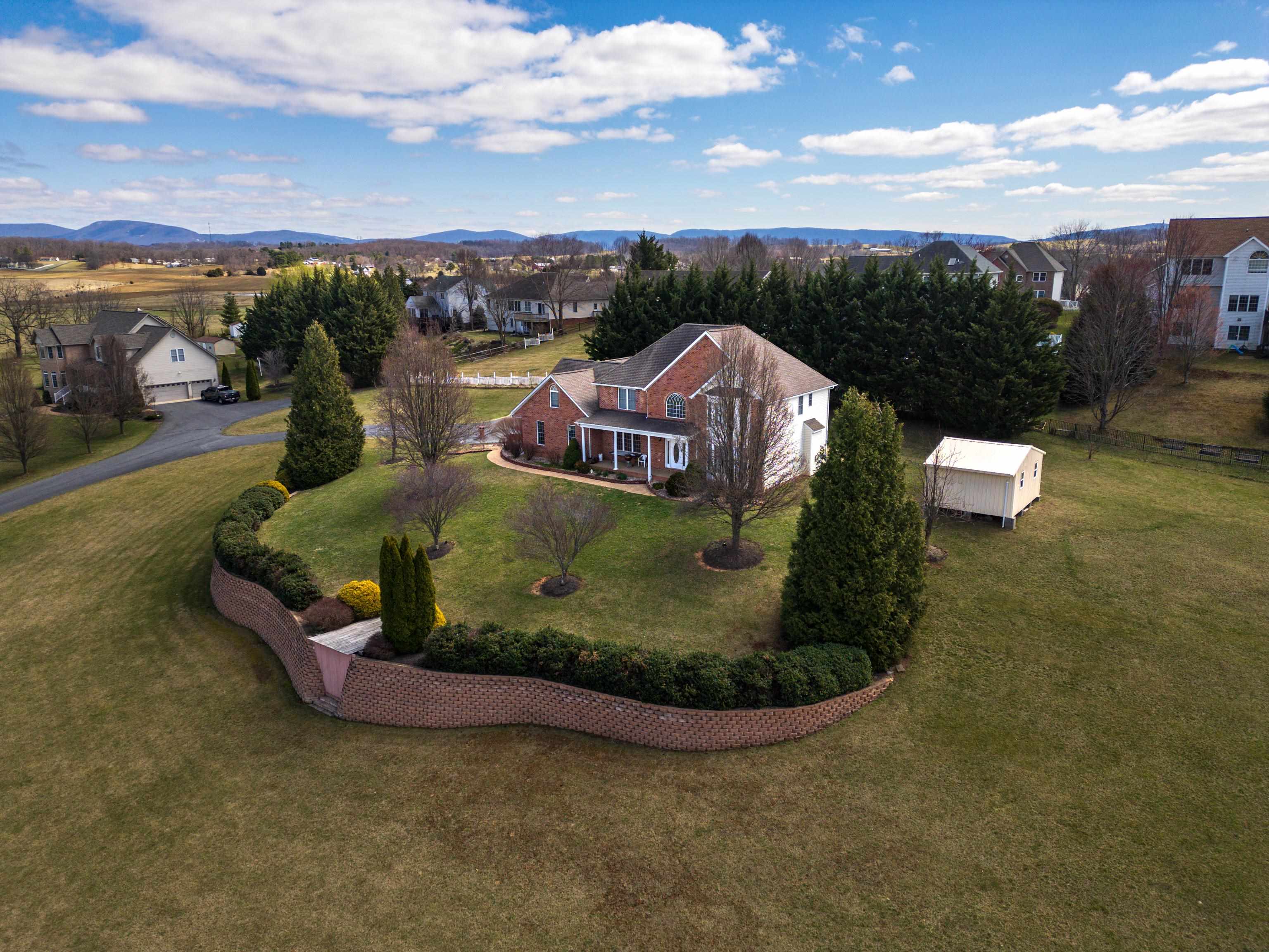 635 Long Meadow Road Fishersville, VA 22939 - Photo 50 of 63 a view of a garden with a lake