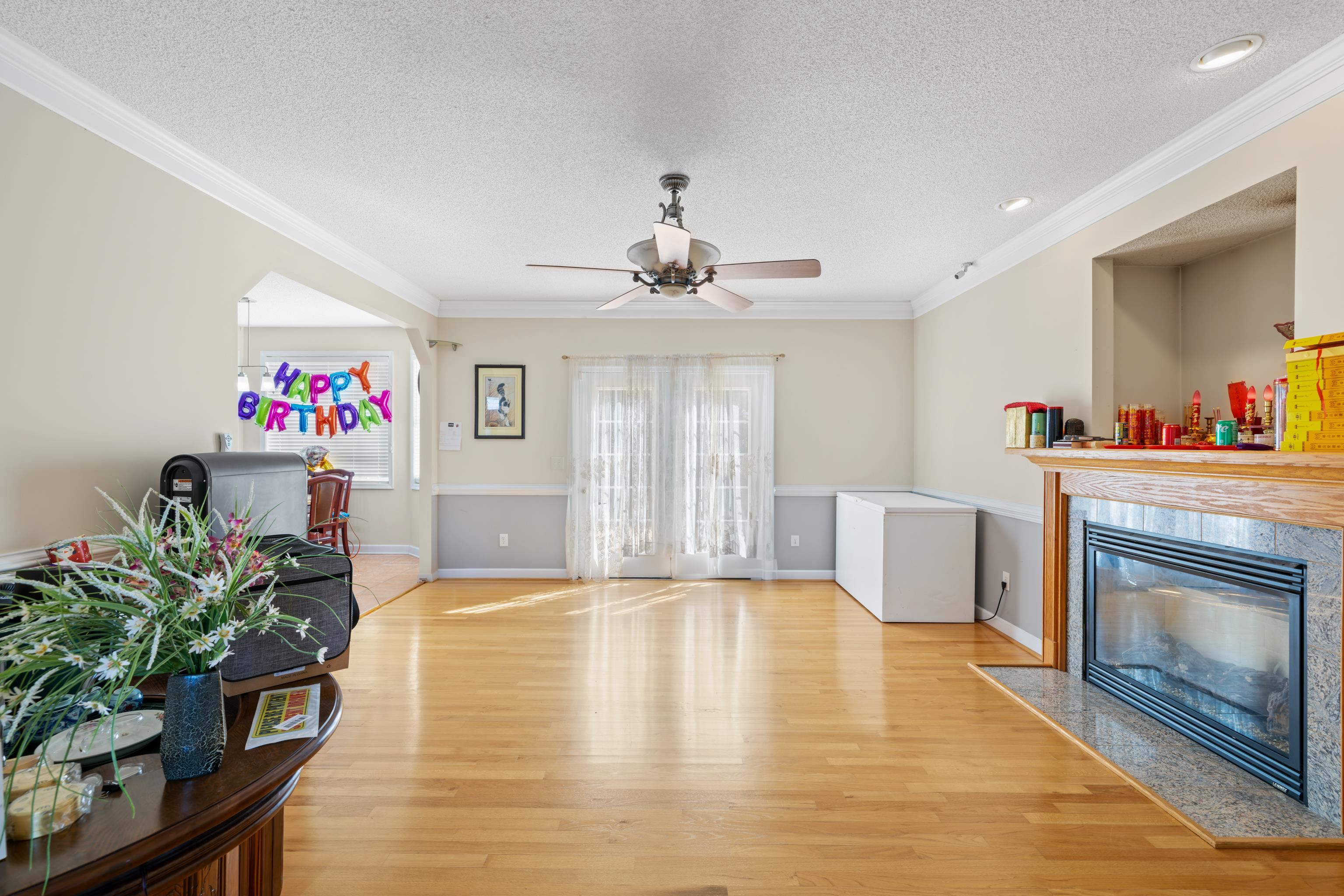 635 Long Meadow Road Fishersville, VA 22939 - Photo 9 of 63 a living room with furniture and a fireplace