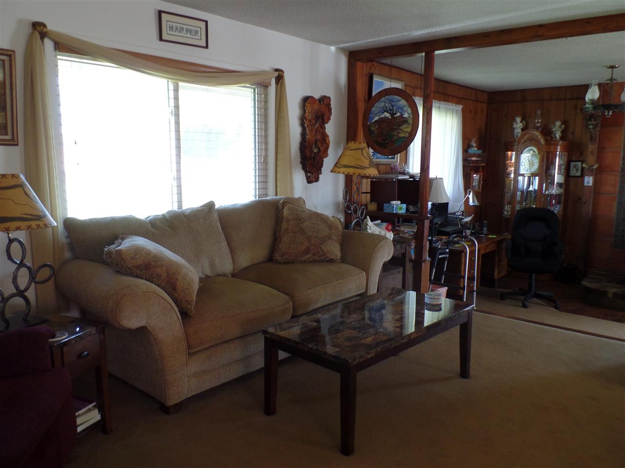 1349 Q Road Loma, CO 81524 - Photo 21 of 32 a living room with furniture and a window