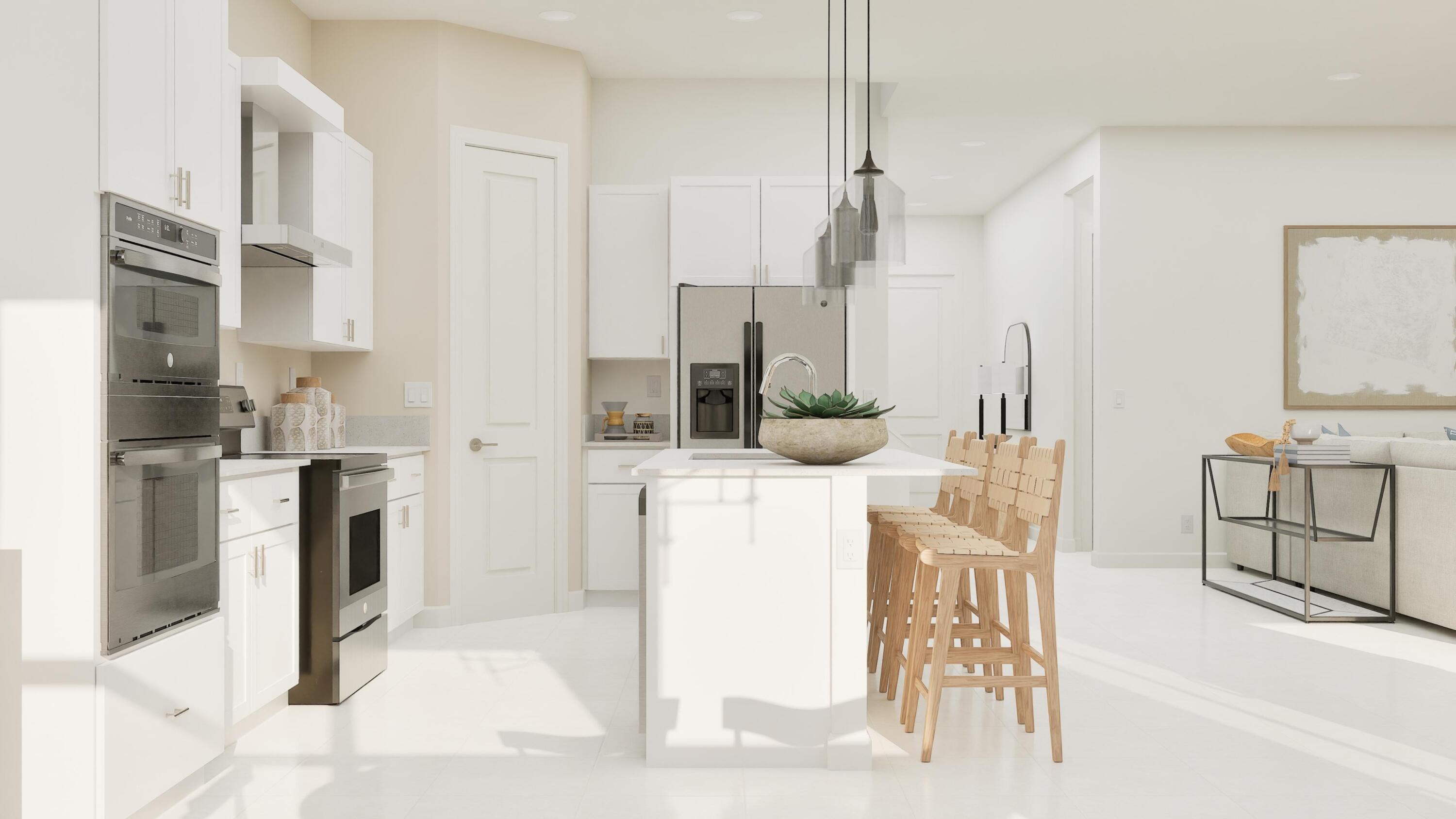 1018 Raleigh Way Wellington, FL 33449 - Photo 17 of 28 a kitchen with stainless steel appliances kitchen island granite countertop a refrigerator a stove and a sink with wooden floor