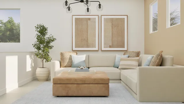 a living room with furniture and a potted plant