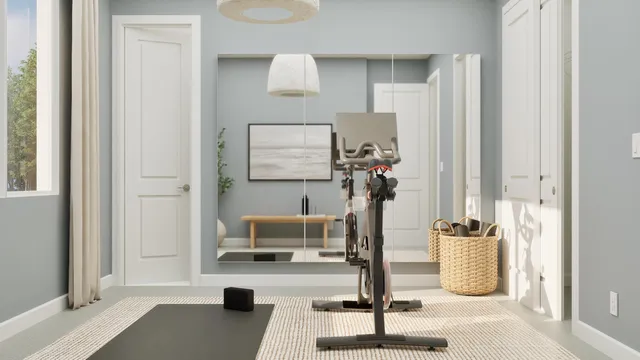 a dining room with table and chairs