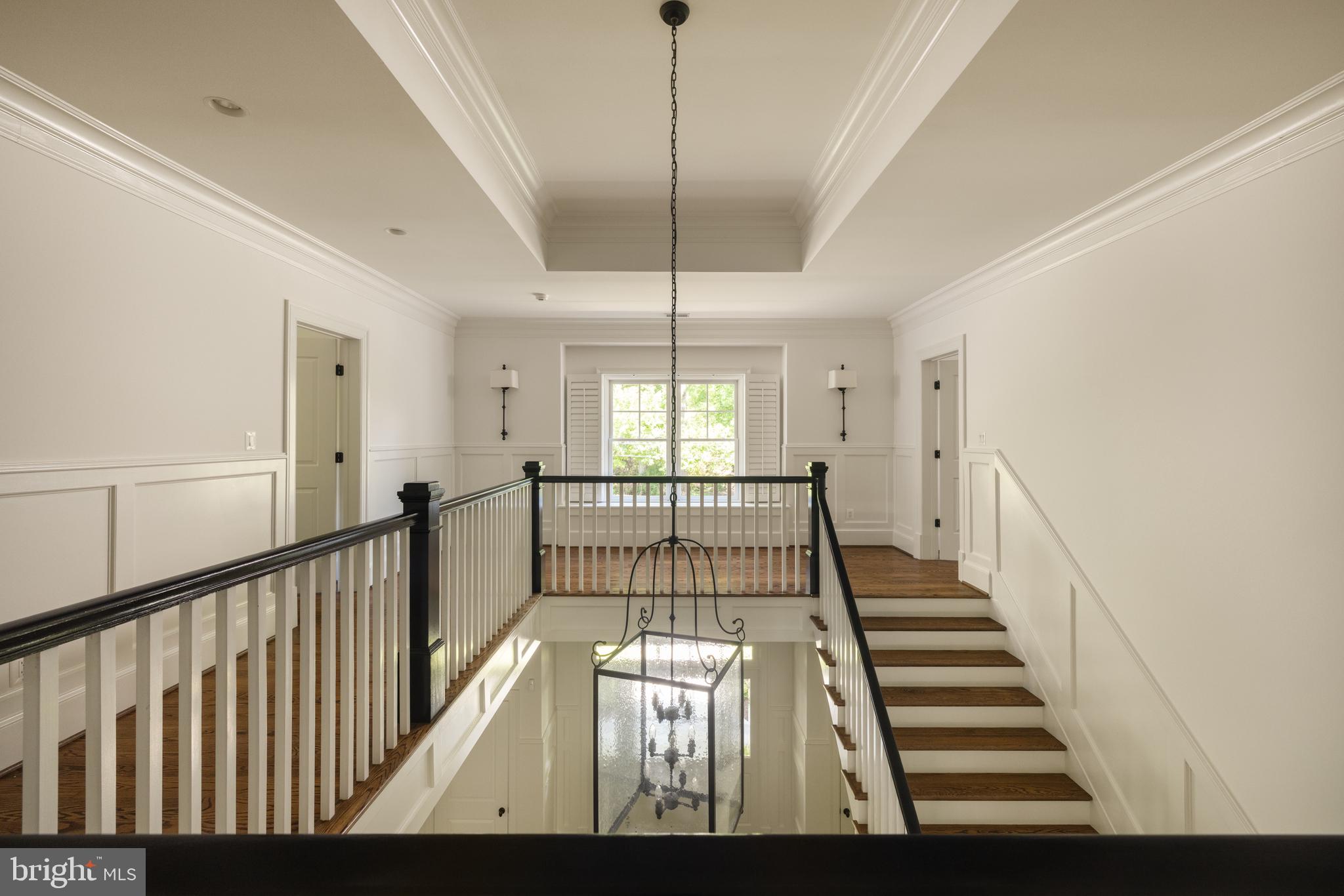 6719 Wemberly Way McLean, VA 22101 - Photo 25 of 50 Upper stair hall with open, light-filled design