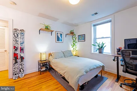 a workspace with furniture and window