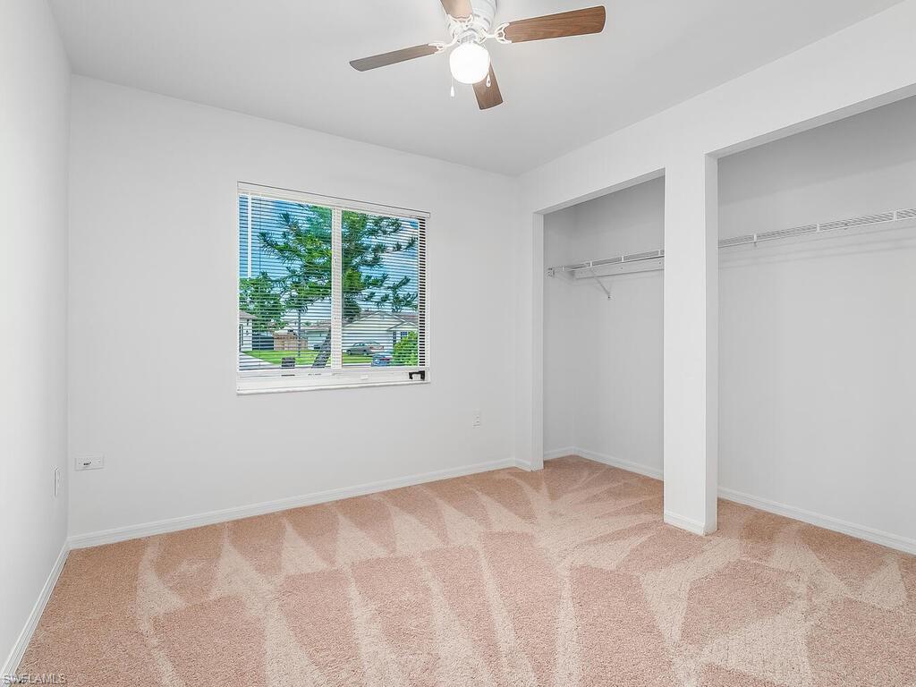 17432 Lee Road Fort Myers, FL 33967 - Photo 12 of 24 a view of an empty room with a window