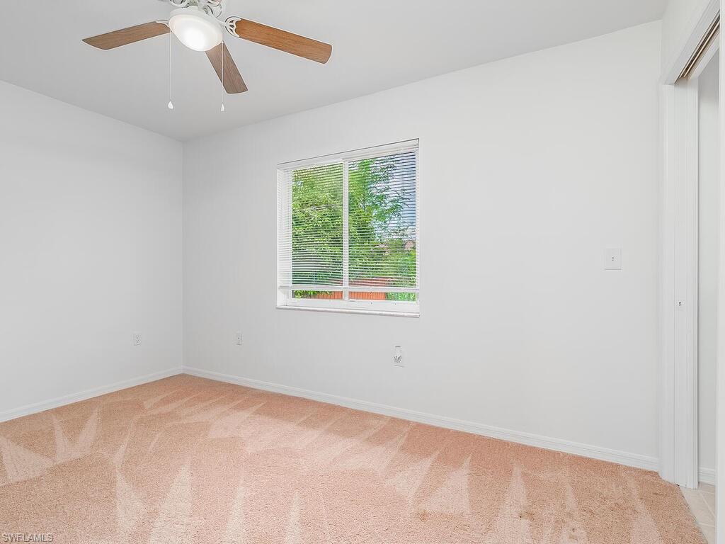 17432 Lee Road Fort Myers, FL 33967 - Photo 13 of 24 an empty room with a window