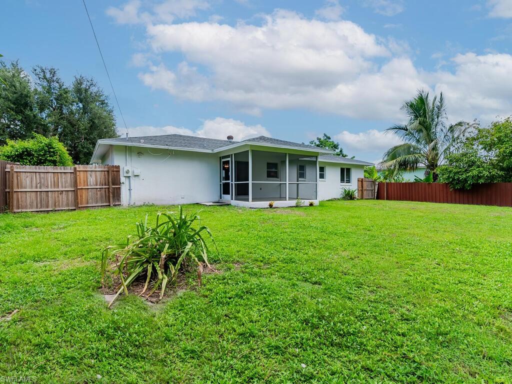 17432 Lee Road Fort Myers, FL 33967 - Photo 22 of 24 a view of a house with a yard and sitting area