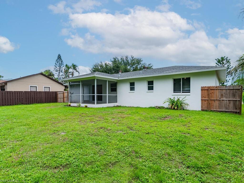 17432 Lee Road Fort Myers, FL 33967 - Photo 23 of 24 a view of a house with backyard and garden