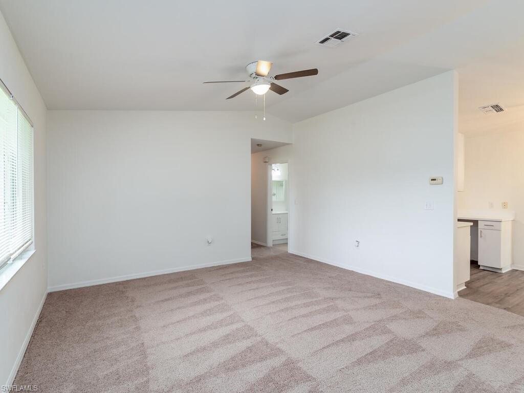 17432 Lee Road Fort Myers, FL 33967 - Photo 3 of 24 a view of an empty room with a window
