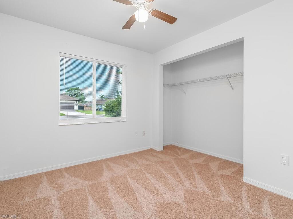 17432 Lee Road Fort Myers, FL 33967 - Photo 10 of 24 a view of an empty room with a window