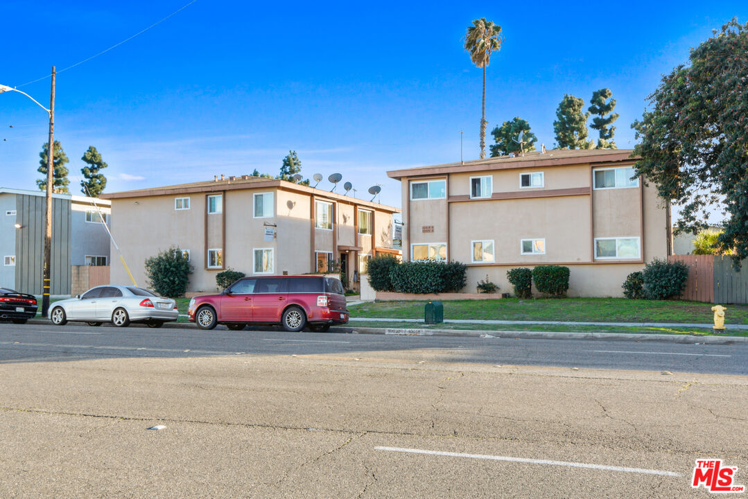 a view of a car in front of a house