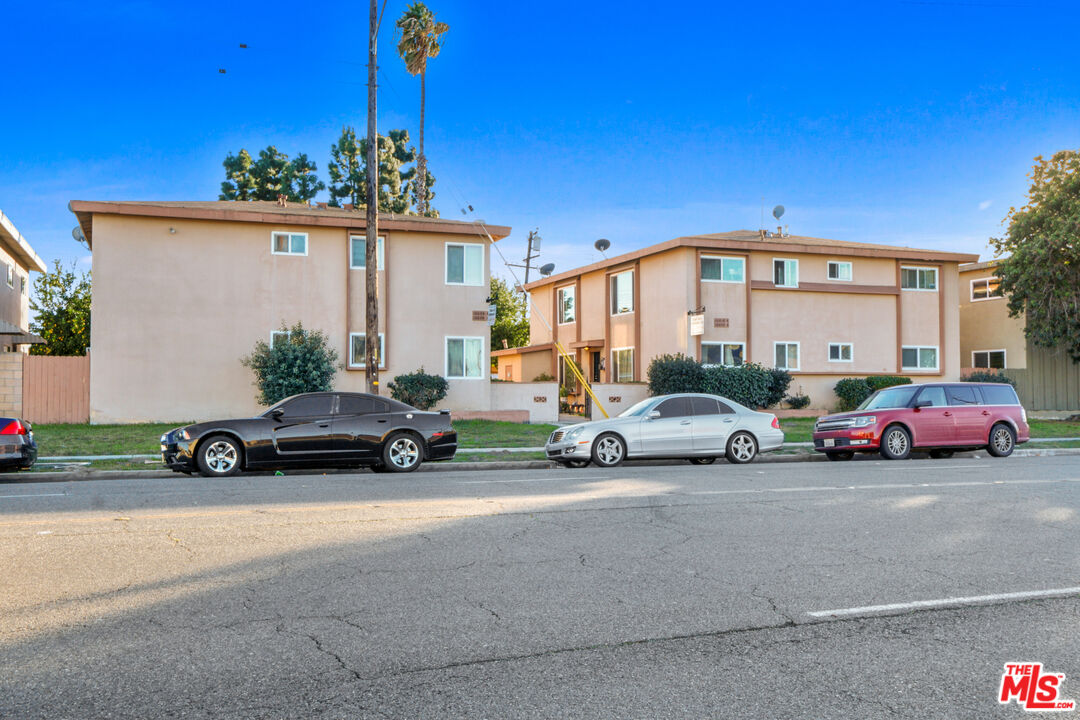 10018 Foster Road Bellflower, CA 90706 - Photo 2 of 10 a car parked in front of a house