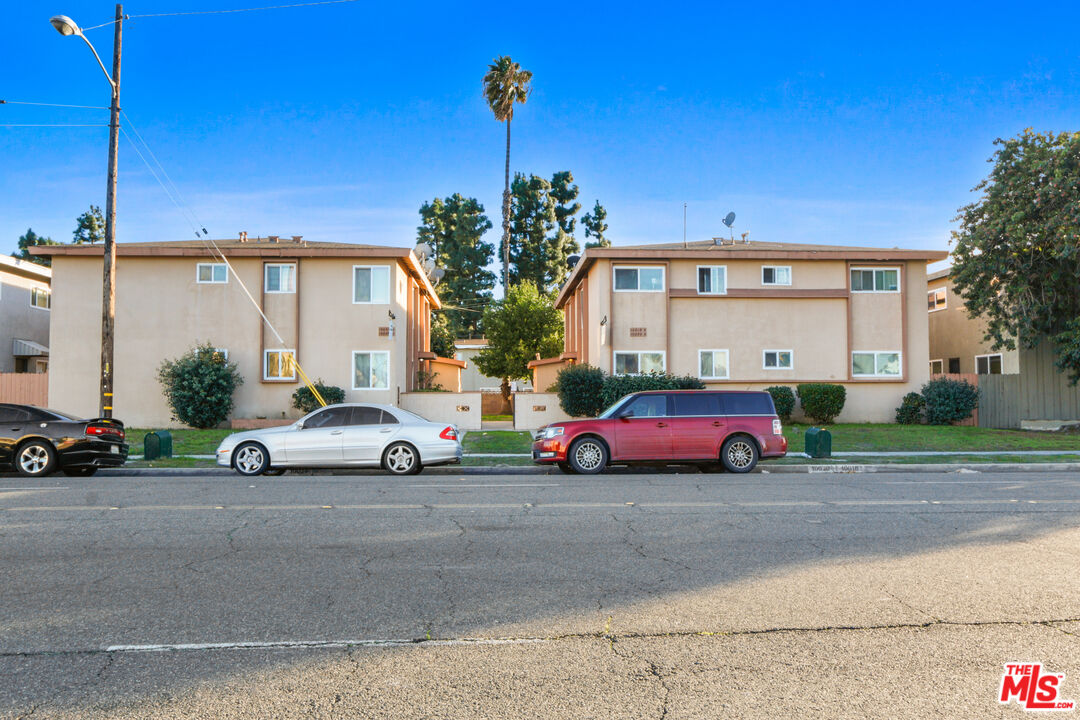 10018 Foster Road Bellflower, CA 90706 - Photo 3 of 10 a view of a car is parked in front of a house