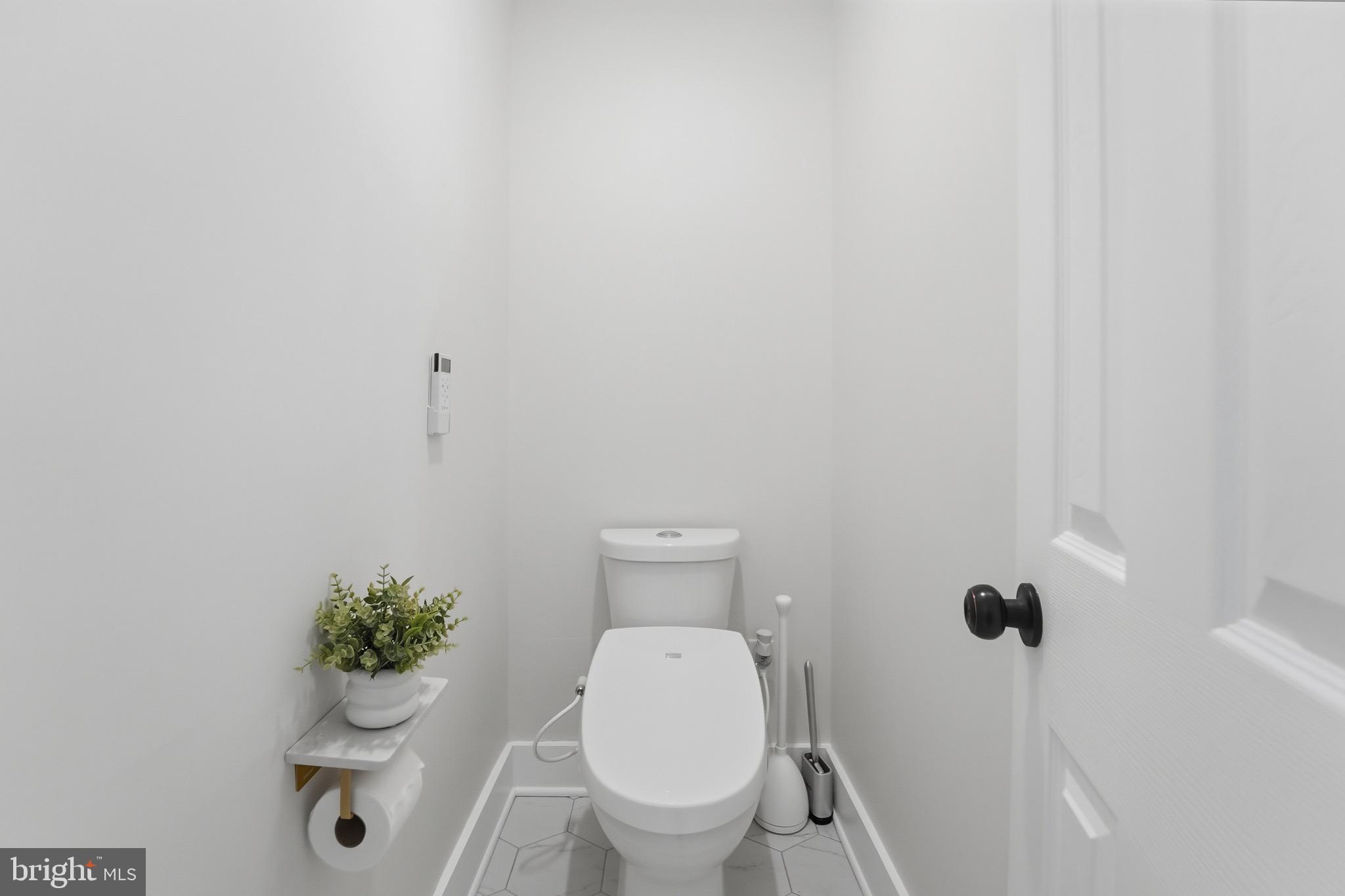 2919 Davidsonville Road Davidsonville, MD 21035 - Photo 21 of 61 a bathroom with a toilet and a shower