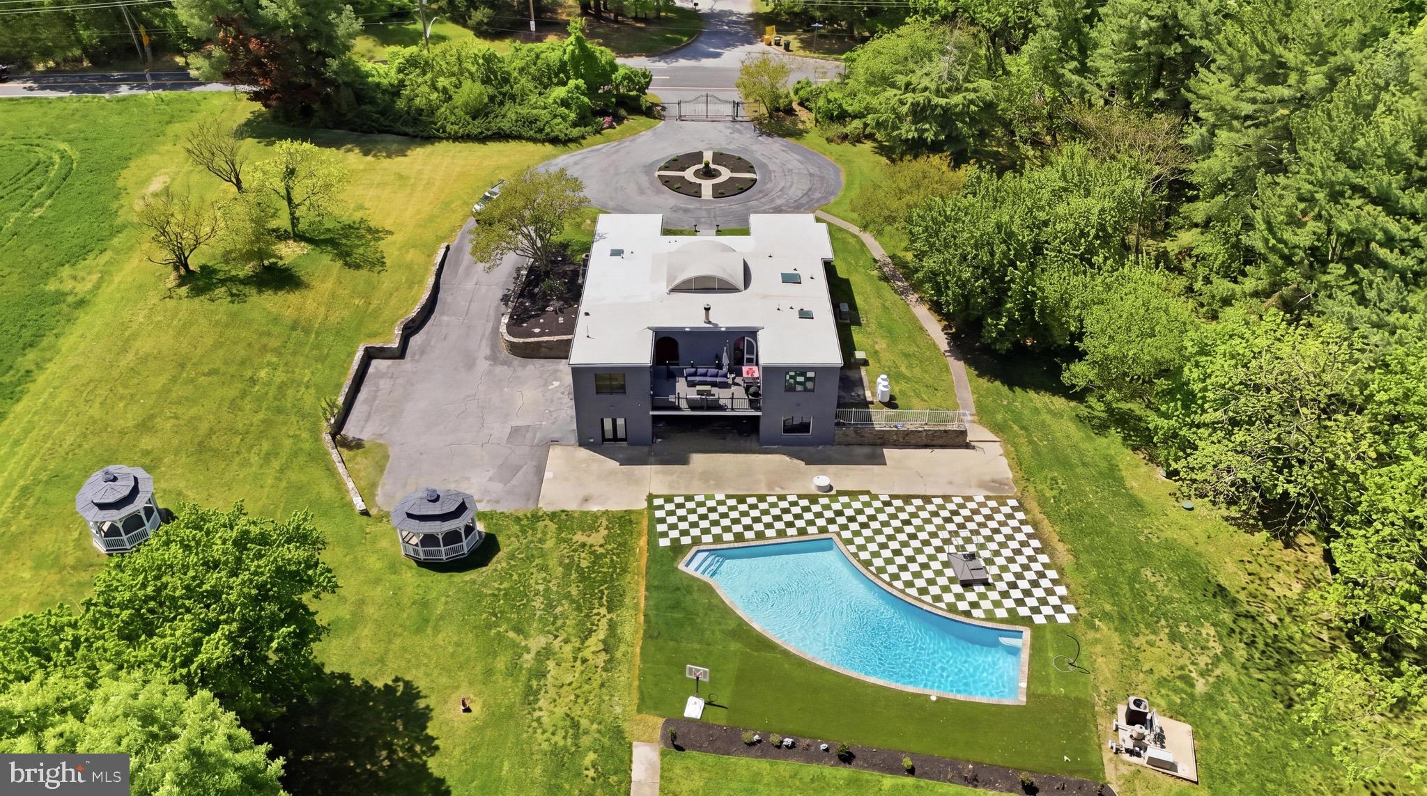 2919 Davidsonville Road Davidsonville, MD 21035 - Photo 58 of 61 an aerial view of a house with swimming pool garden and stairs