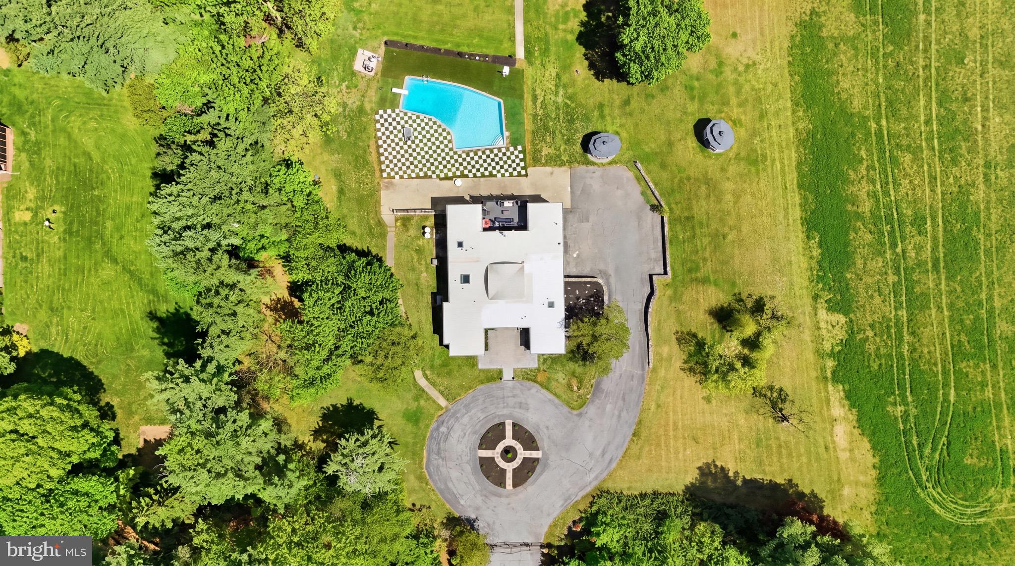 2919 Davidsonville Road Davidsonville, MD 21035 - Photo 61 of 61 an aerial view of a house with a yard and swimming pool