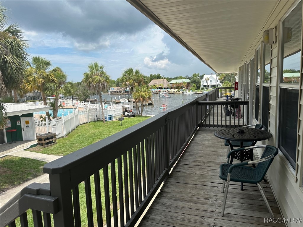 5291 South Cherokee Way Homosassa, FL 34448 - Photo 5 of 27 a view of a balcony with chairs