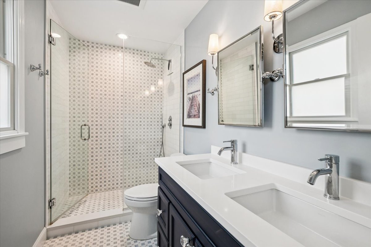 216 East Scranton Avenue Lake Bluff, IL 60044 - Photo 17 of 32 a bathroom with a sink toilet and shower