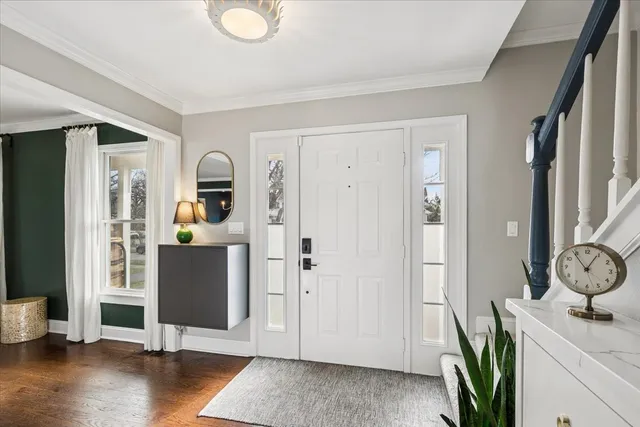 a view of kitchen with furniture and wooden floor