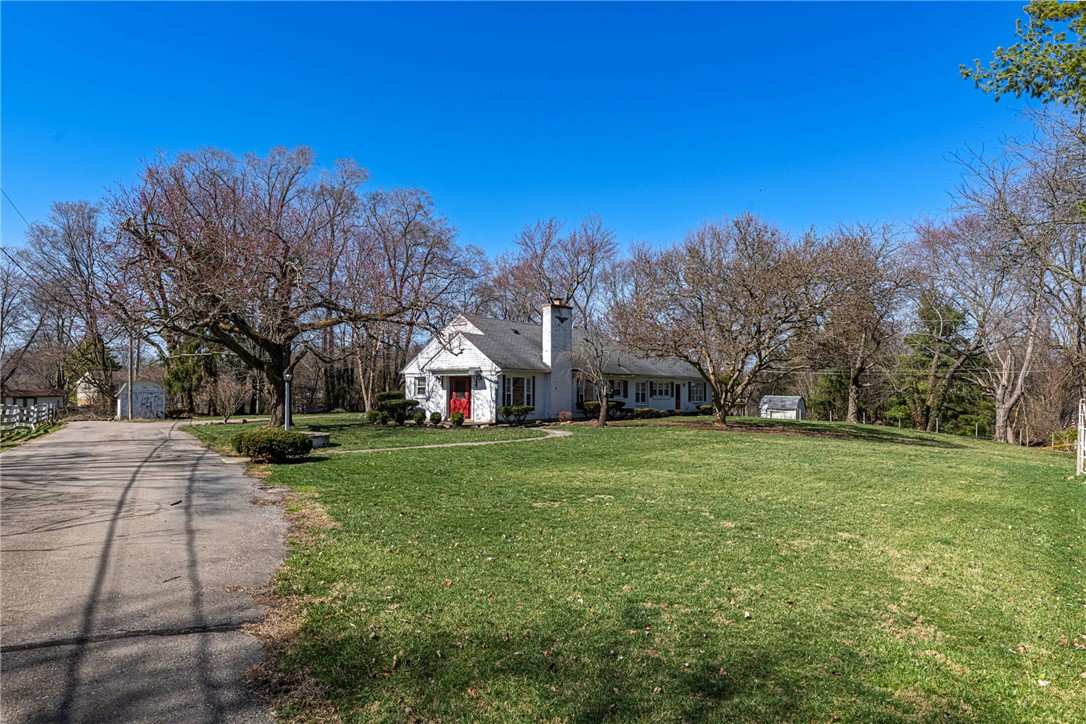 6885 Garber Road Clayton, OH 45415 - Photo 23 of 24 This charming residence offers a peaceful retreat with a spacious yard and classic architectural details.