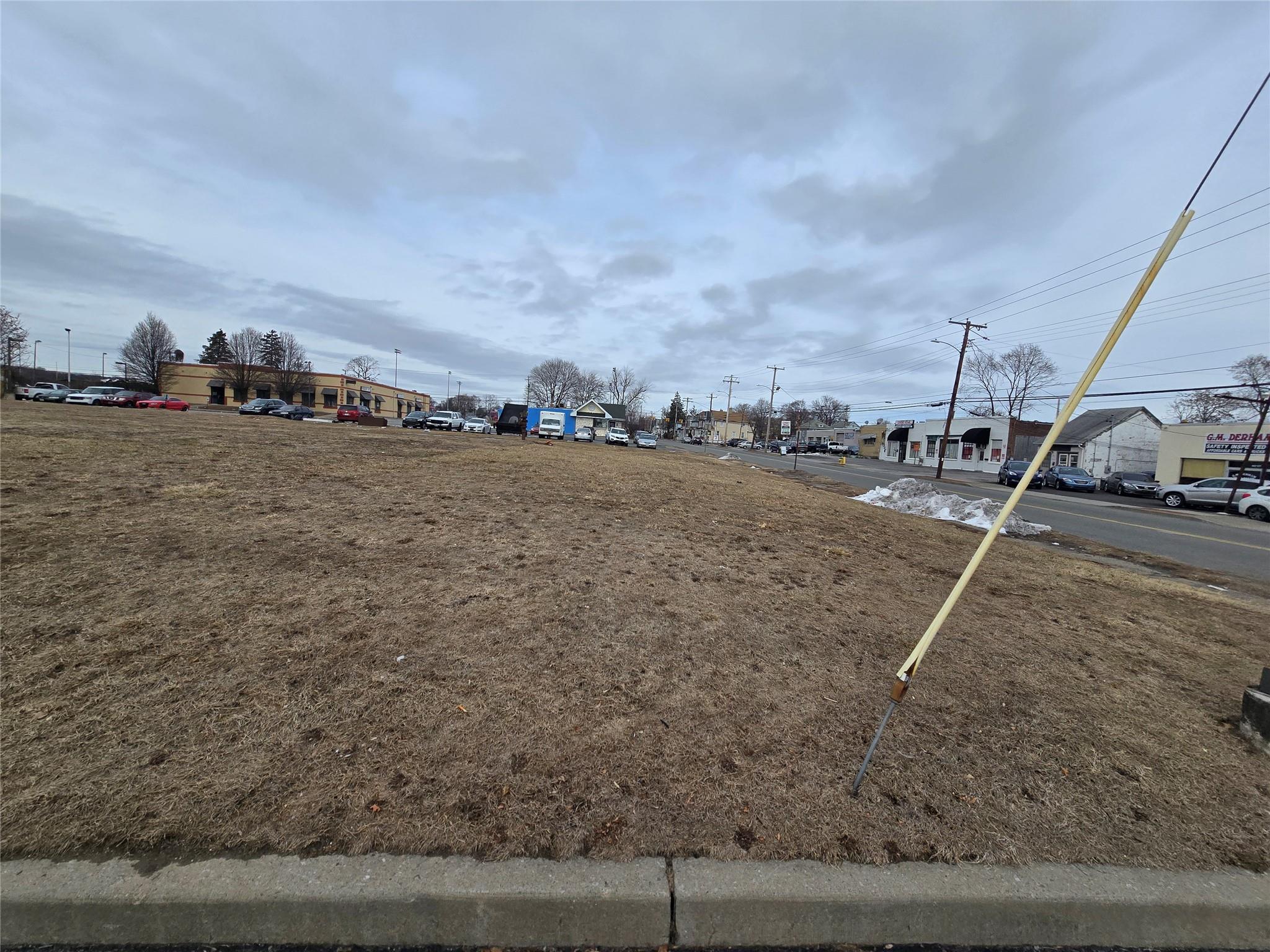102 South Robinson Avenue Newburgh, NY 12550 - Photo 7 of 7 a view of a dry yard with wooden fence