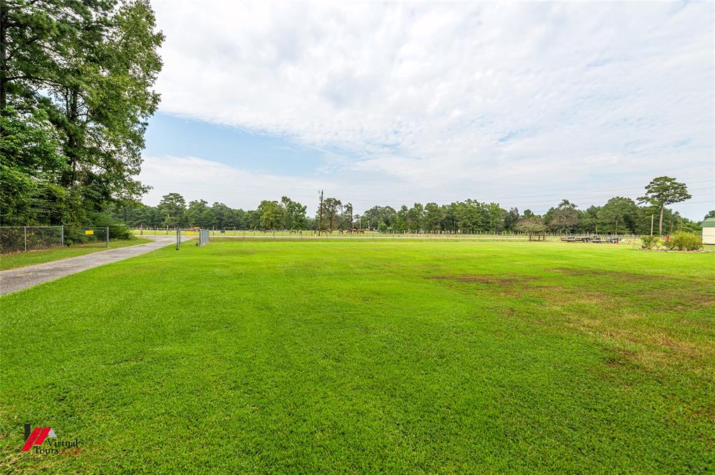 469 Foreman Road Doyline, LA 71023 - Photo 11 of 32 a view of yard with swimming pool and green space
