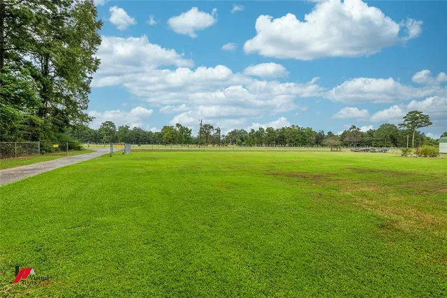 a view of a golf course with a garden