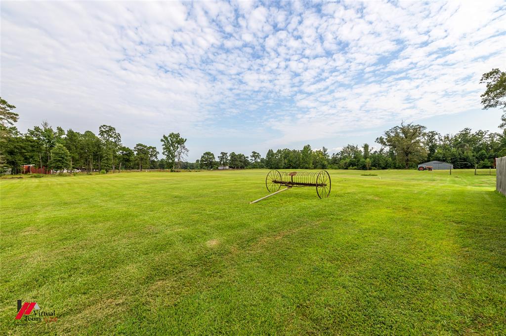 469 Foreman Road Doyline, LA 71023 - Photo 13 of 32 a view of a golf course with a lake