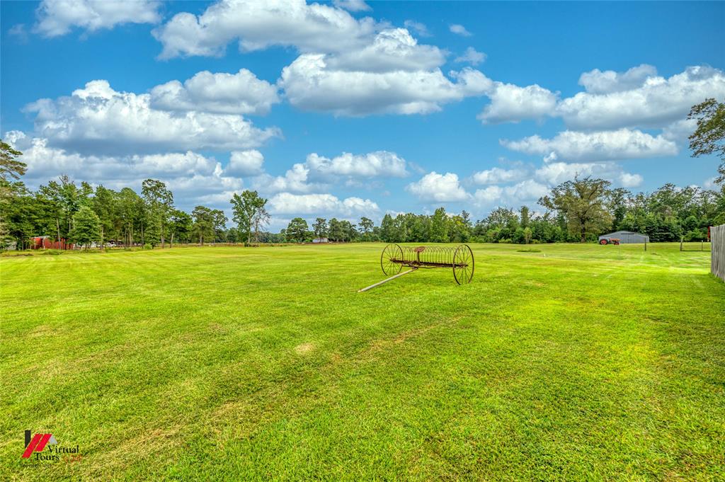 469 Foreman Road Doyline, LA 71023 - Photo 14 of 32 a view of a golf course with a lake