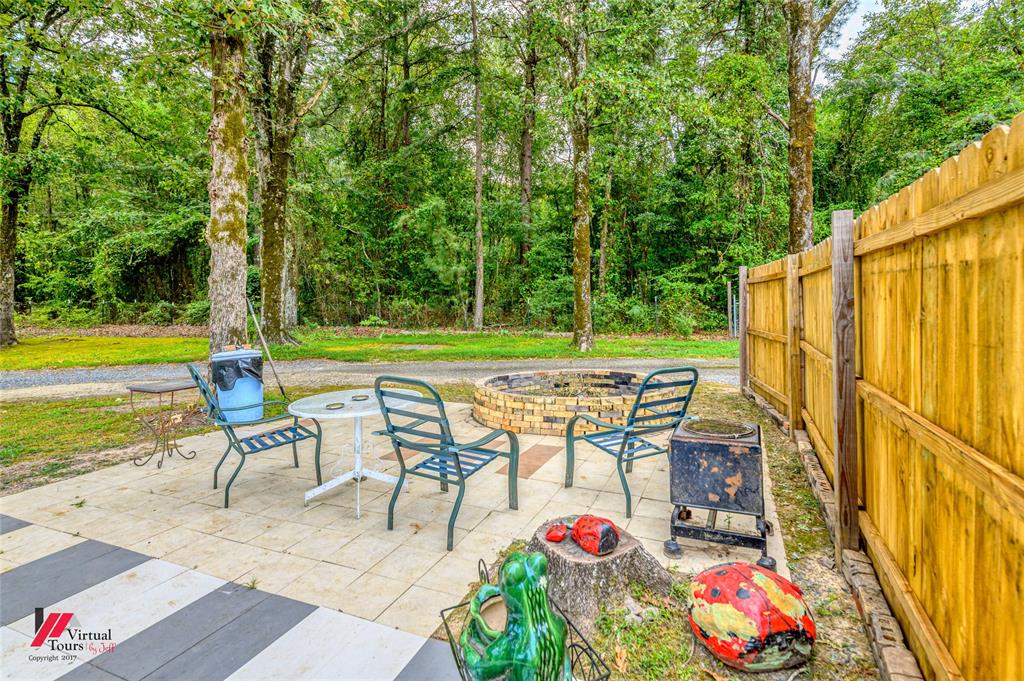 469 Foreman Road Doyline, LA 71023 - Photo 21 of 32 an outdoor space with furniture and garden