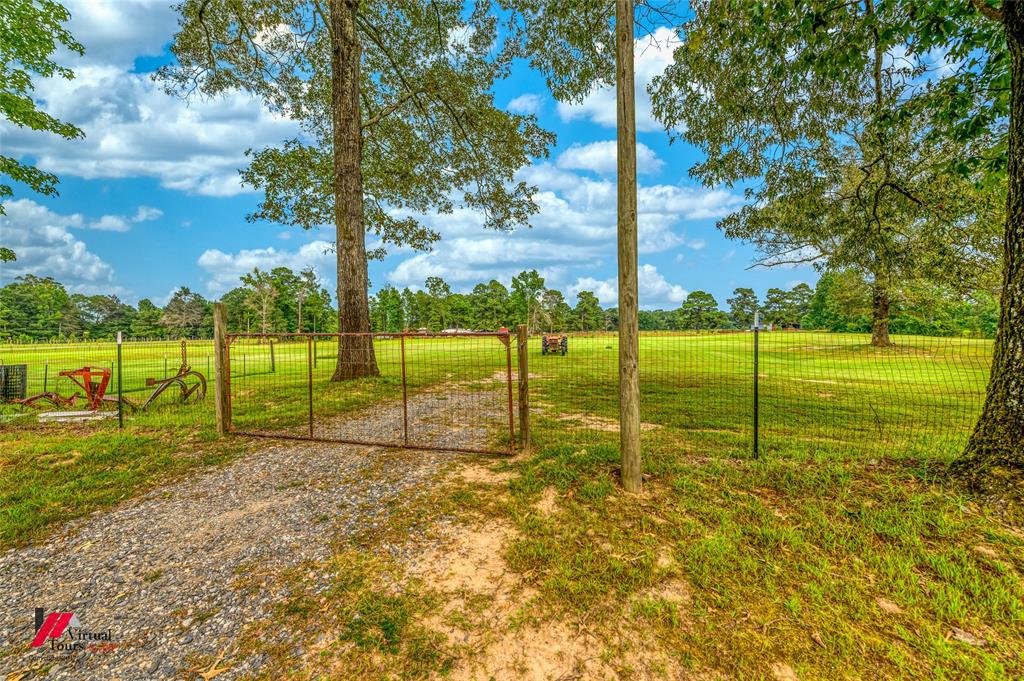 469 Foreman Road Doyline, LA 71023 - Photo 30 of 32 a view of a garden with a slide