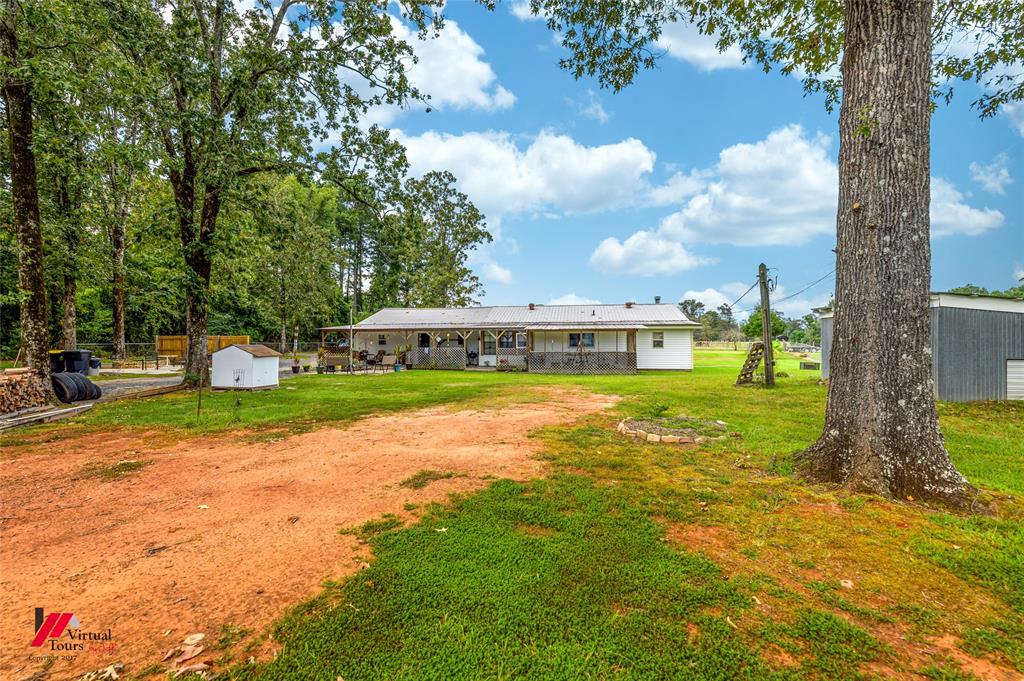 469 Foreman Road Doyline, LA 71023 - Photo 31 of 32 a front view of a house with a yard