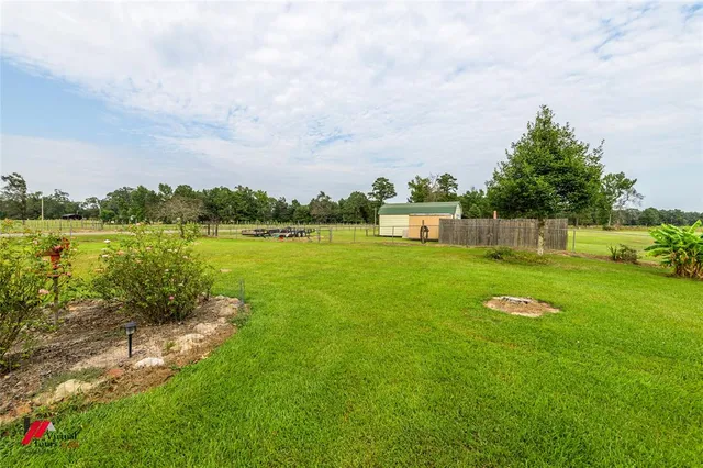 a view of a lake with a big yard
