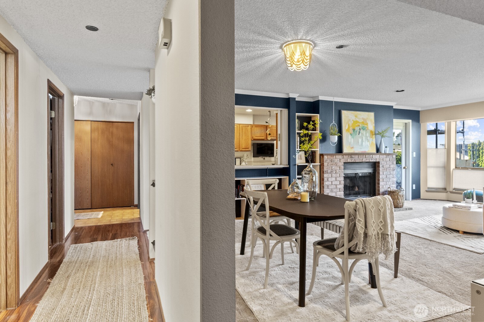 1902 Bridgeport Way West, Unit 106 University Place, WA 98466 - Photo 11 of 25 a view of a a dining room with furniture window and wooden floor